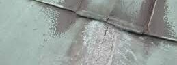 Faulty seams on a metal roof